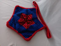 a blue and red crocheted spider - man purse